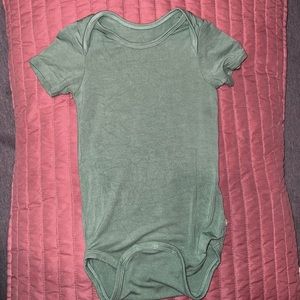 Kyte baby bodysuit in Matcha.